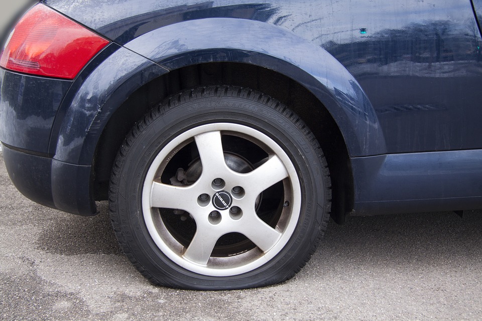 Dealing with a Flat Tire on a Busy Highway: What You Need to Know